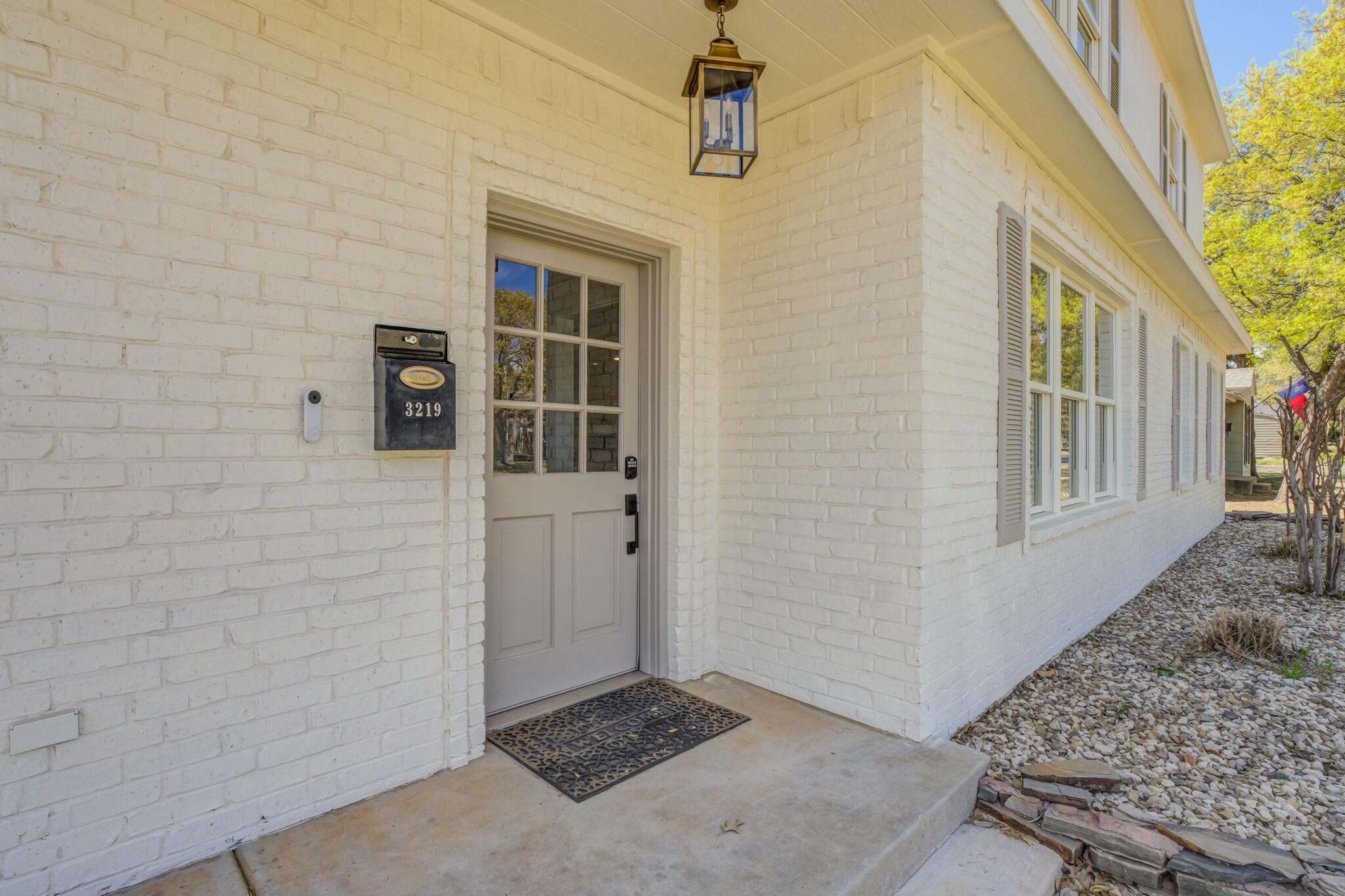 3219 22nd Street Lubbock, TX 79410 - Photo 2 of 51 a view of front door of house