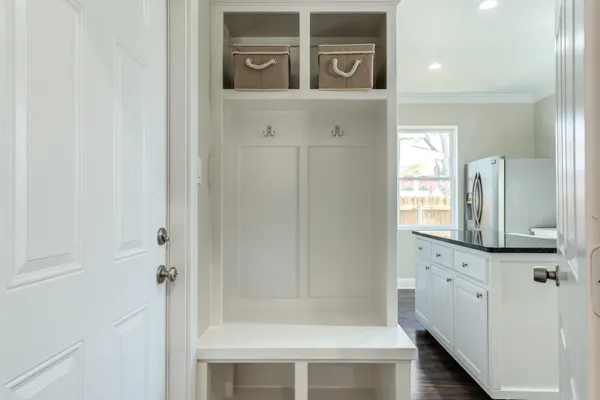 a bathroom with a mirror and a shower