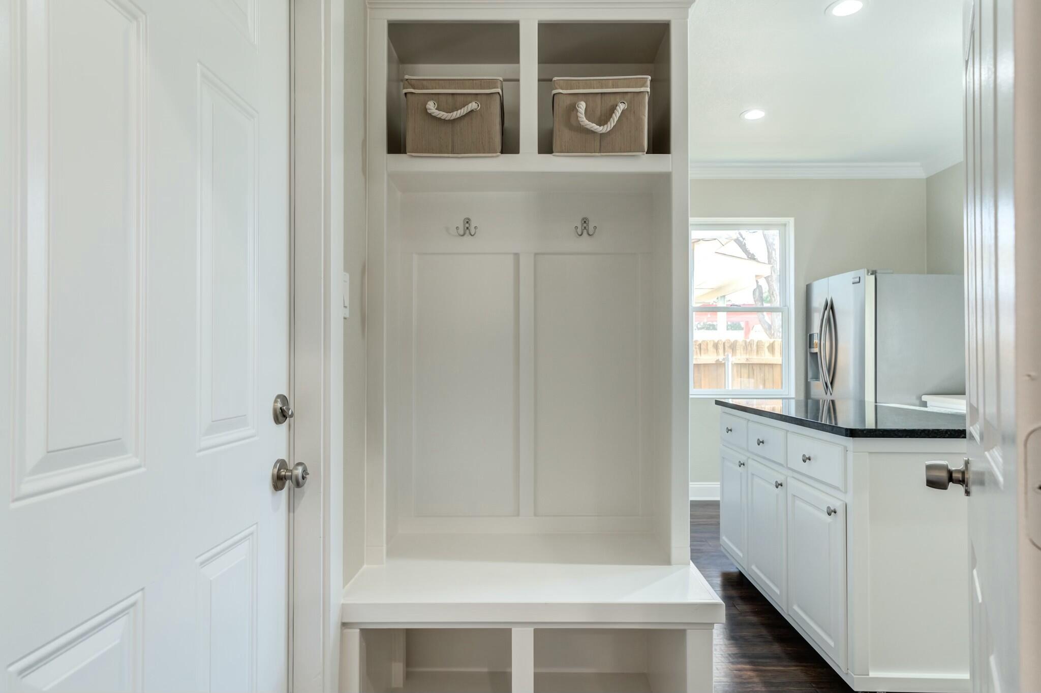 3219 22nd Street Lubbock, TX 79410 - Photo 21 of 51 a bathroom with a mirror and a shower
