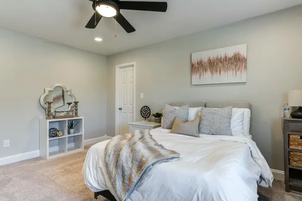 a view of a a dining room with furniture window and wooden floor