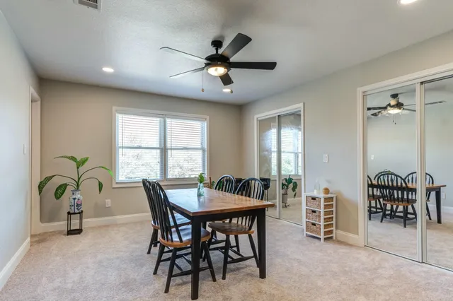 a bathroom with a shower and a sink