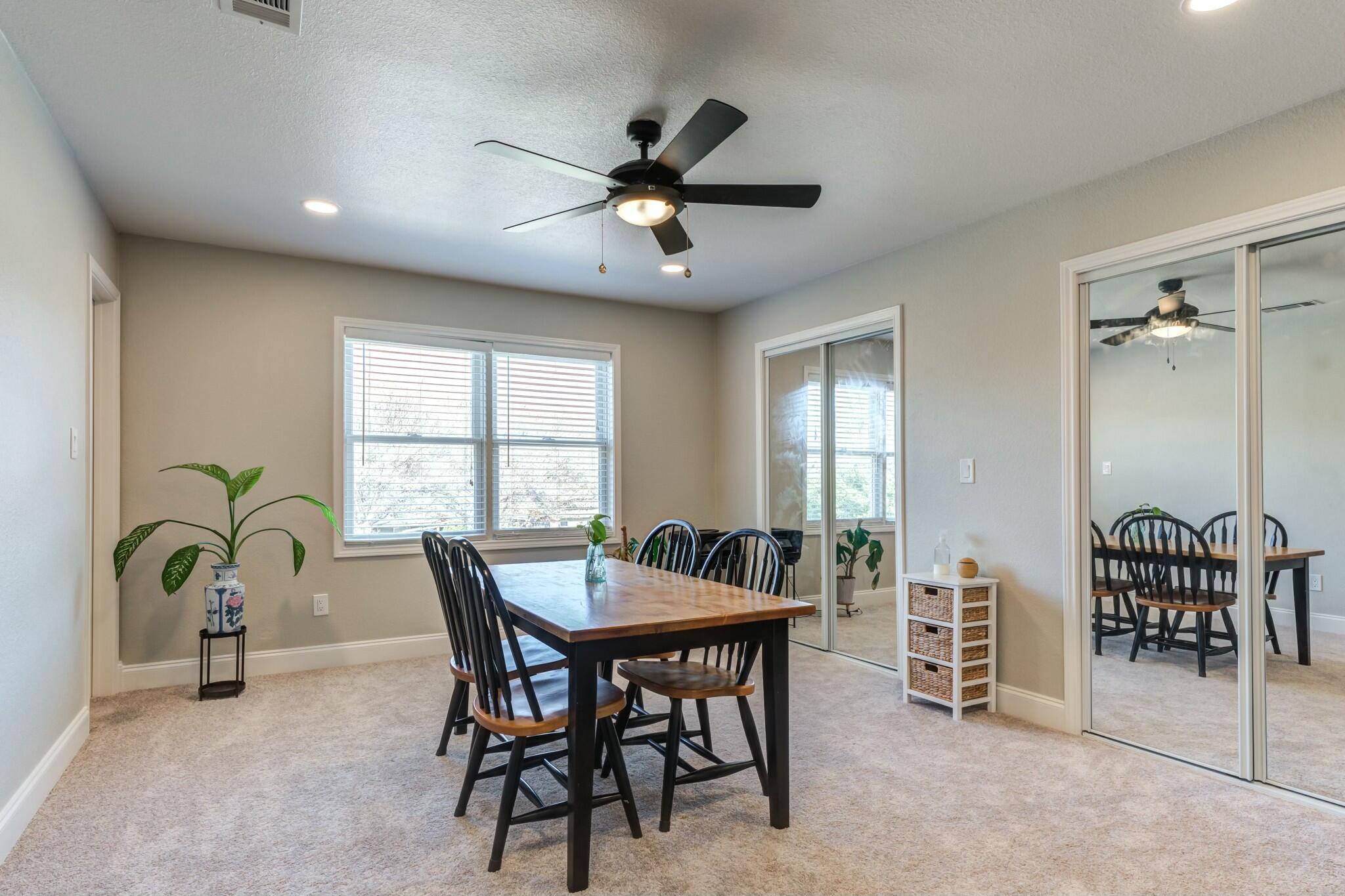 3219 22nd Street Lubbock, TX 79410 - Photo 35 of 51 a view of a a dining room with furniture window and wooden floor