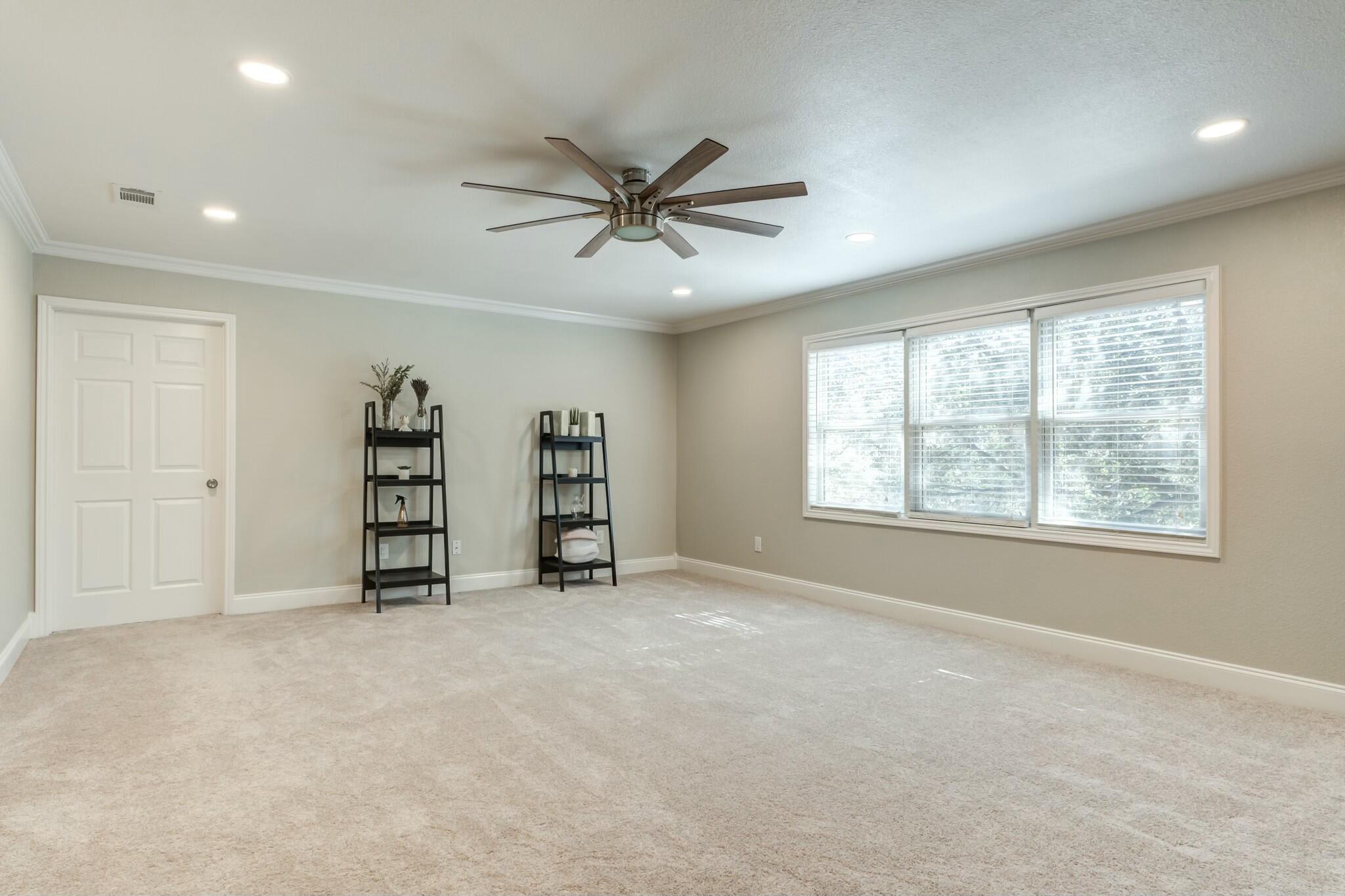 3219 22nd Street Lubbock, TX 79410 - Photo 38 of 51 a view of an empty room with a window