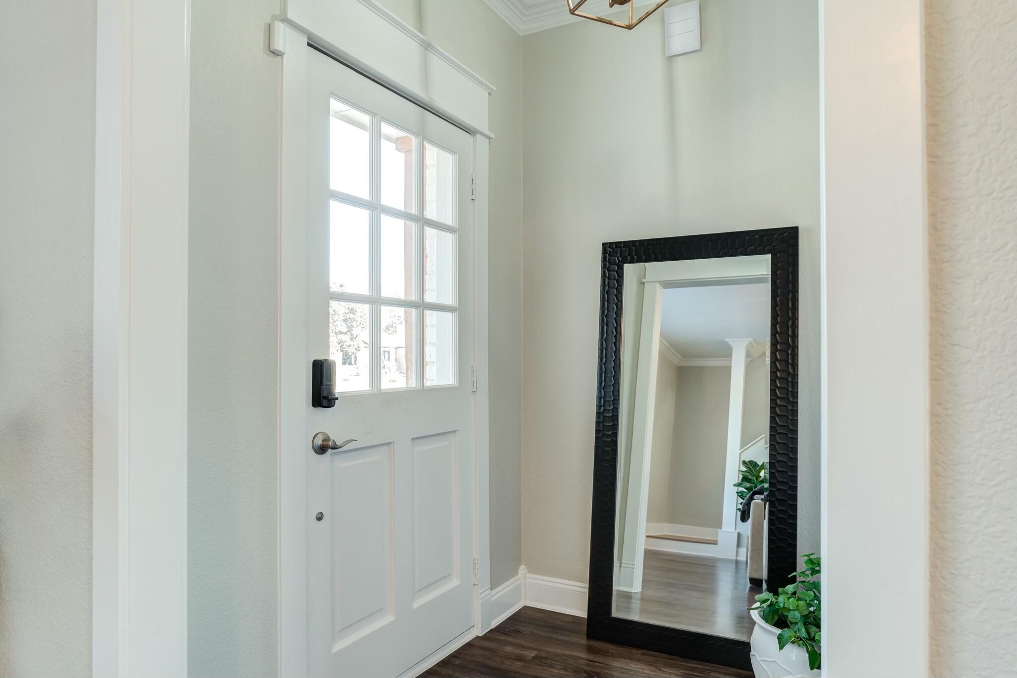 3219 22nd Street Lubbock, TX 79410 - Photo 4 of 51 a view of front door with a door