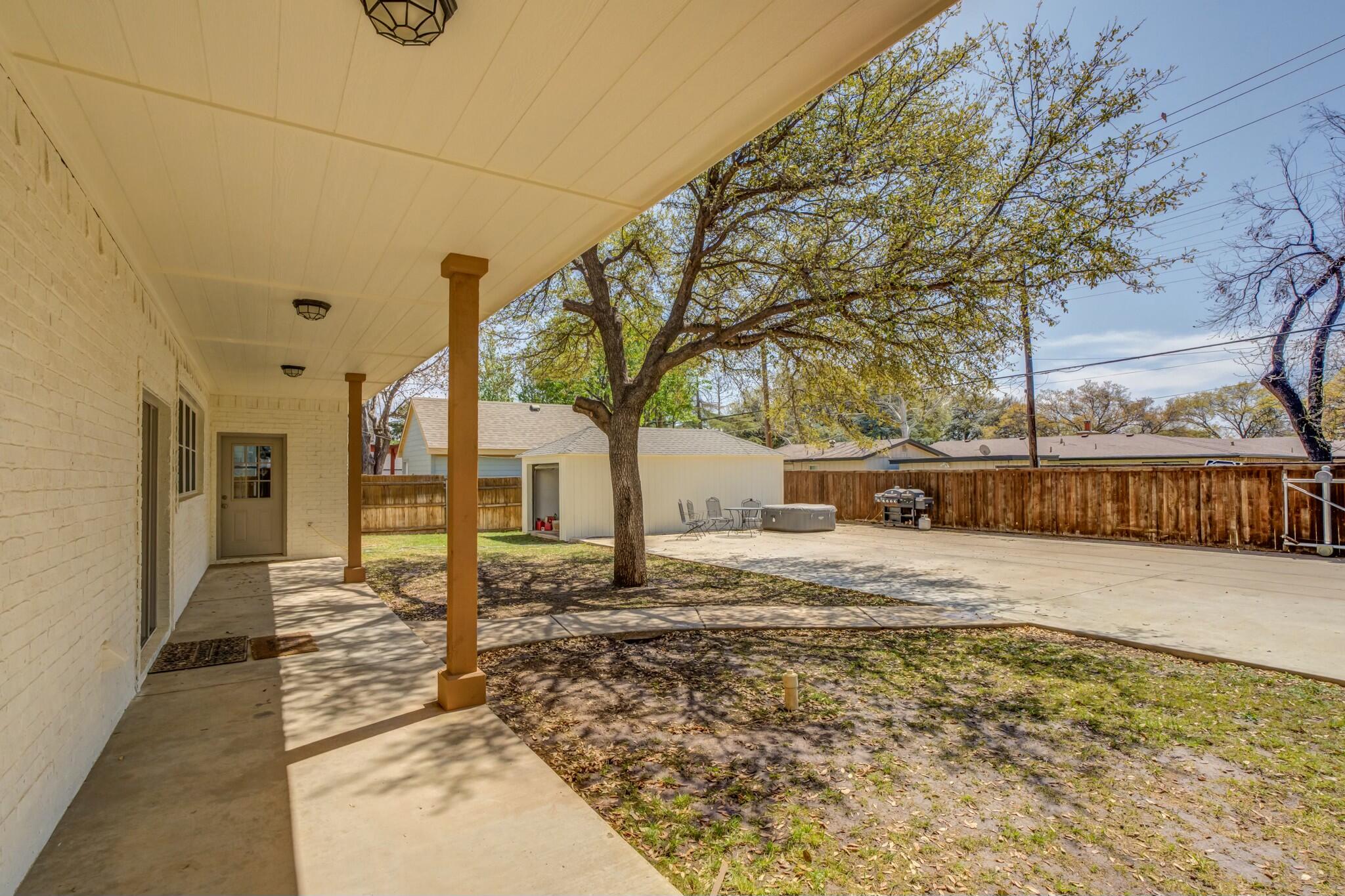 3219 22nd Street Lubbock, TX 79410 - Photo 49 of 51 a view of a house with snow on the road