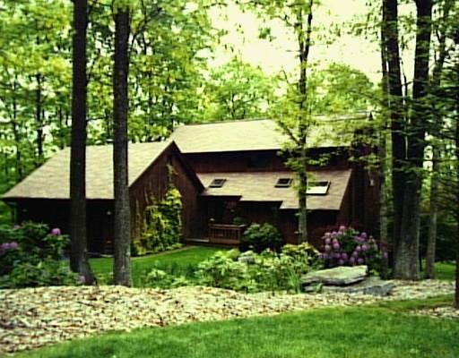128 Bart Road Monroe, CT 06468 - Photo 1 of 1 a view of a house with a yard and plants