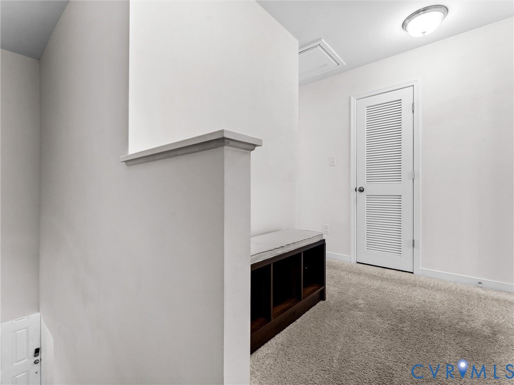 6135 Buntline Lane Richmond, VA 23234 - Photo 20 of 34 a view of empty room with floor to ceiling window and fireplace