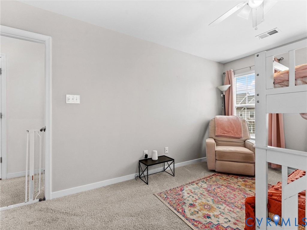6135 Buntline Lane Richmond, VA 23234 - Photo 25 of 34 a living room with furniture and a couch