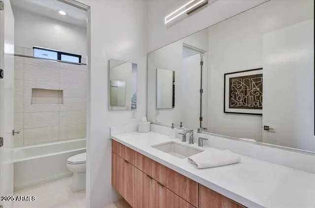 a workspace with furniture and a book shelf
