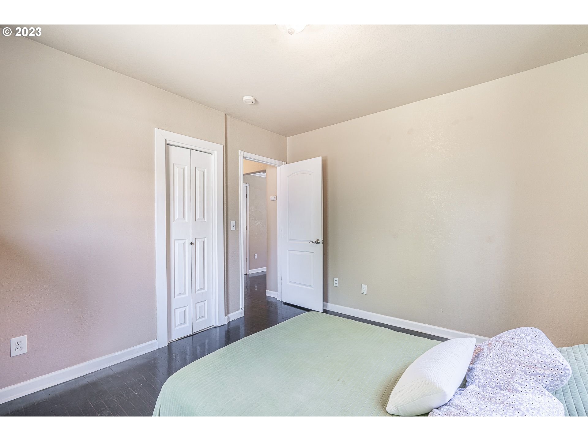 1255 North Kilpatrick Street Portland, OR 97217 - Photo 11 of 30 a bedroom with a bed and a shower