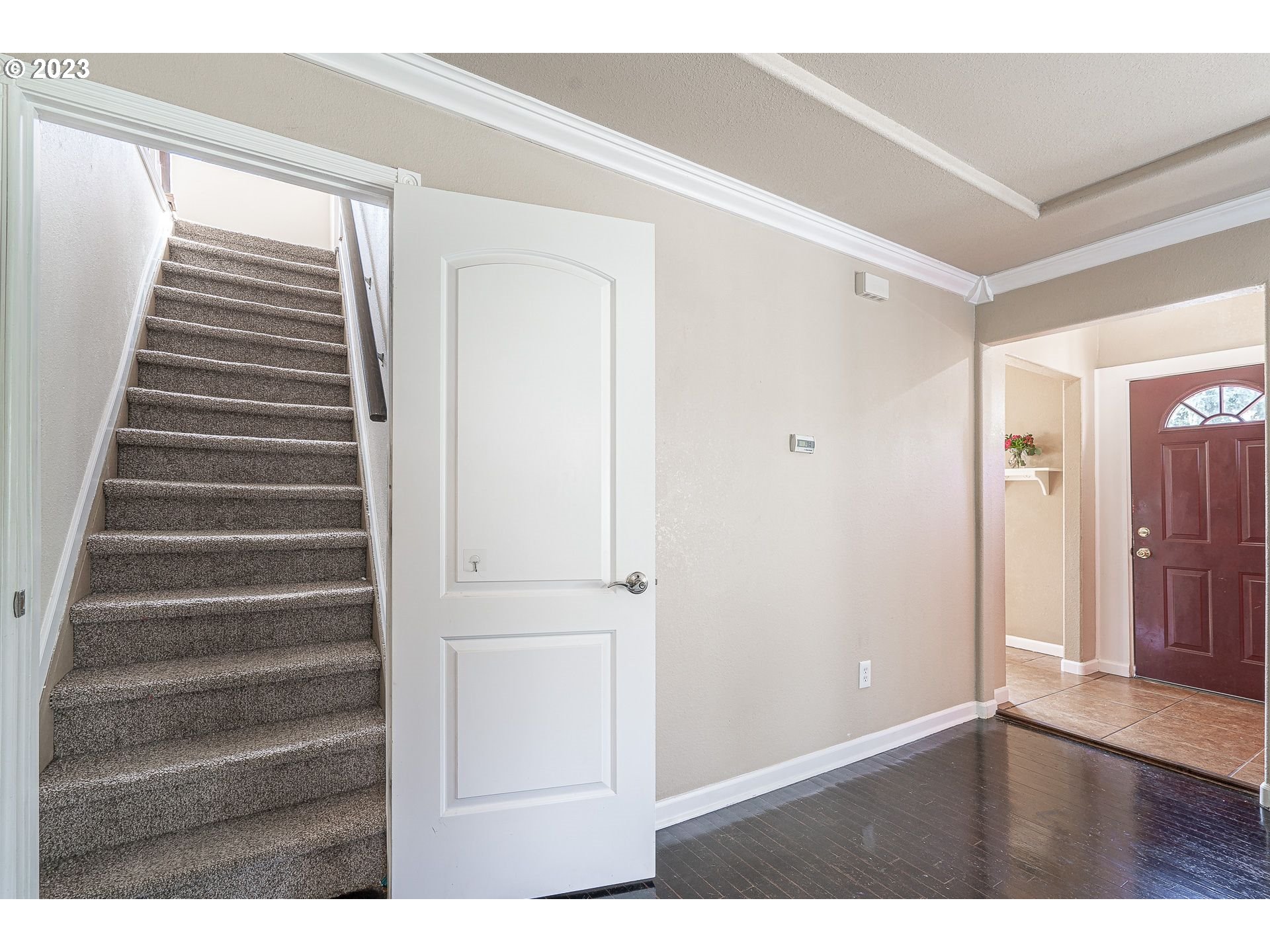 1255 North Kilpatrick Street Portland, OR 97217 - Photo 19 of 30 a view of an entryway with wooden floor