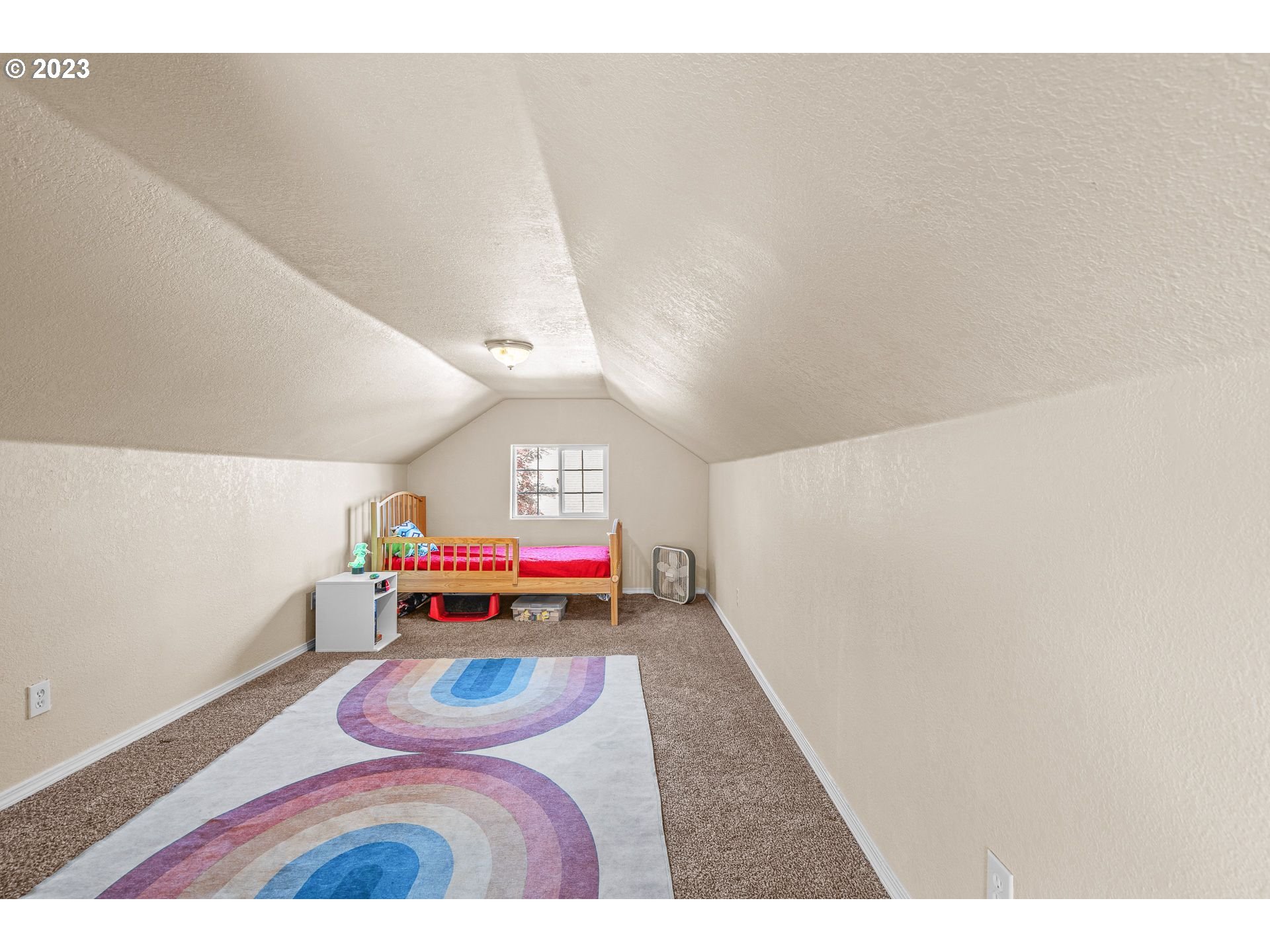 1255 North Kilpatrick Street Portland, OR 97217 - Photo 21 of 30 a room with furniture and a rug
