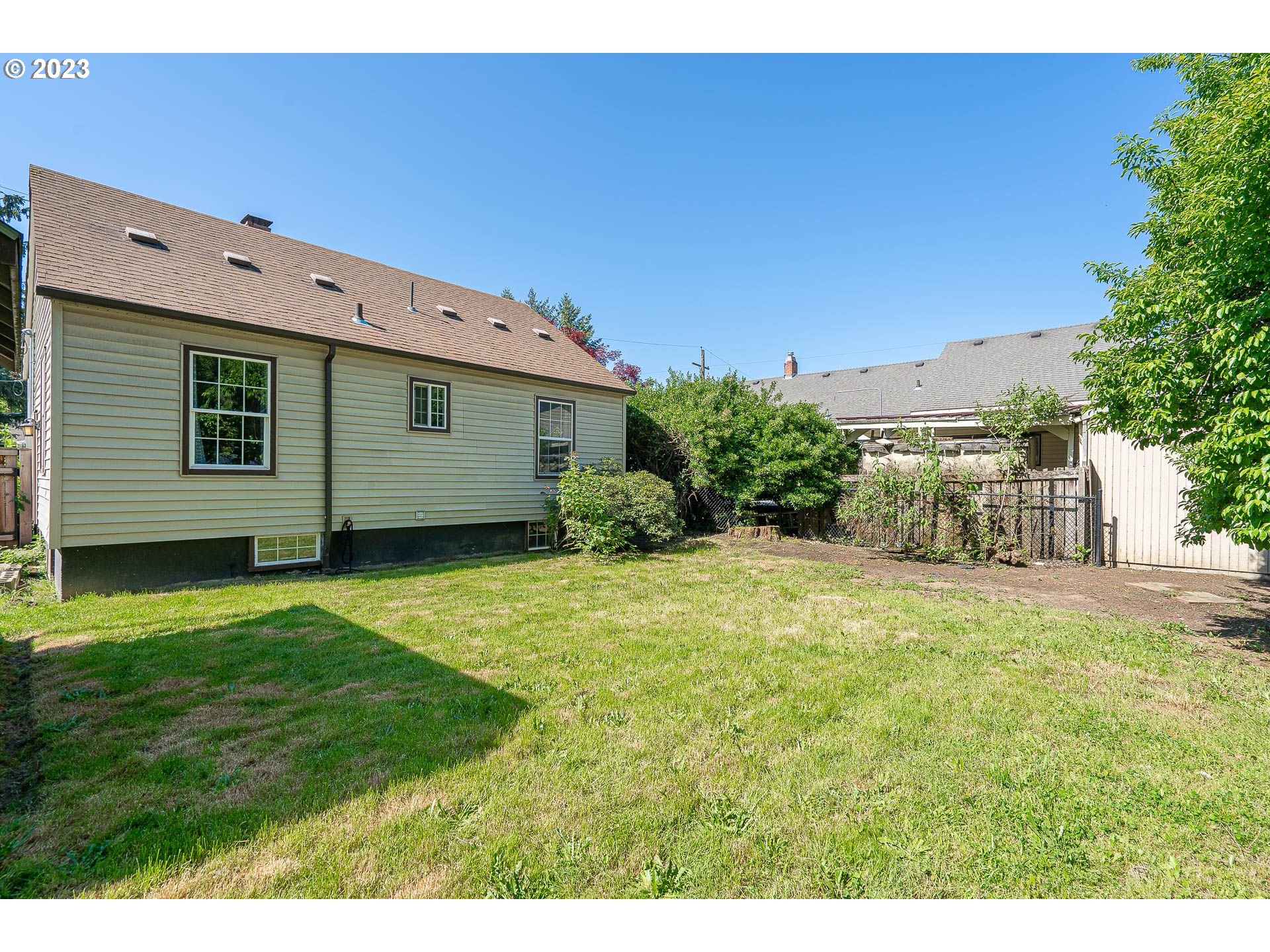1255 North Kilpatrick Street Portland, OR 97217 - Photo 29 of 30 a view of a backyard with potted plants