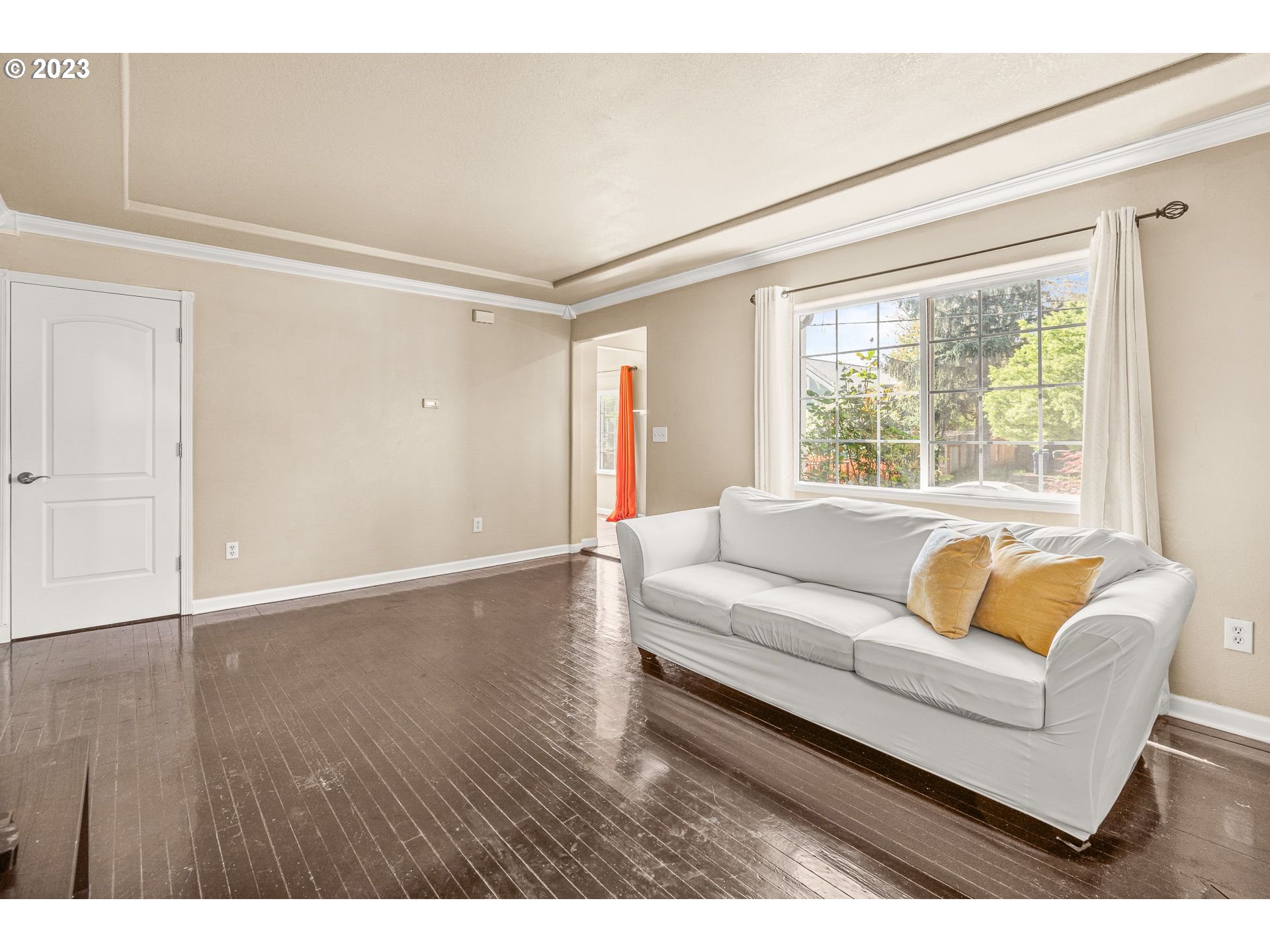1255 North Kilpatrick Street Portland, OR 97217 - Photo 7 of 30 a living room with furniture and a large window