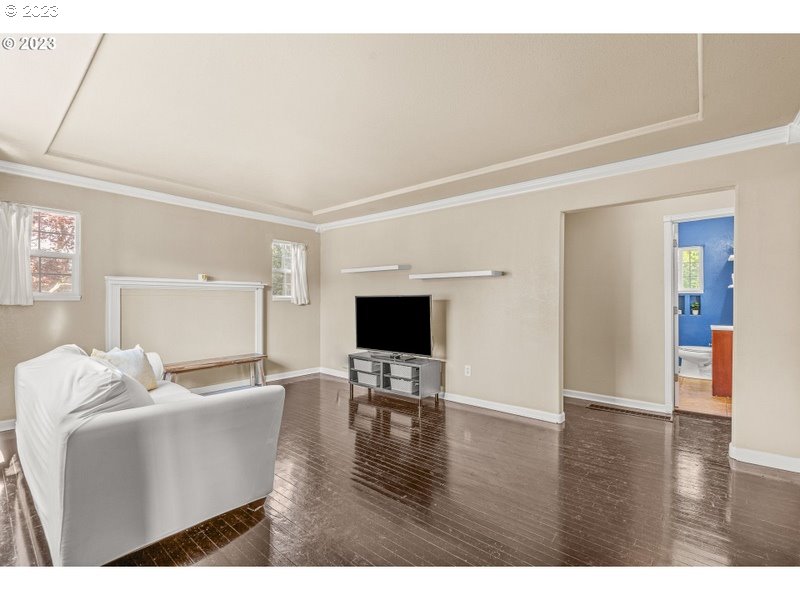 1255 North Kilpatrick Street Portland, OR 97217 - Photo 8 of 30 a living room with furniture and a wooden floor