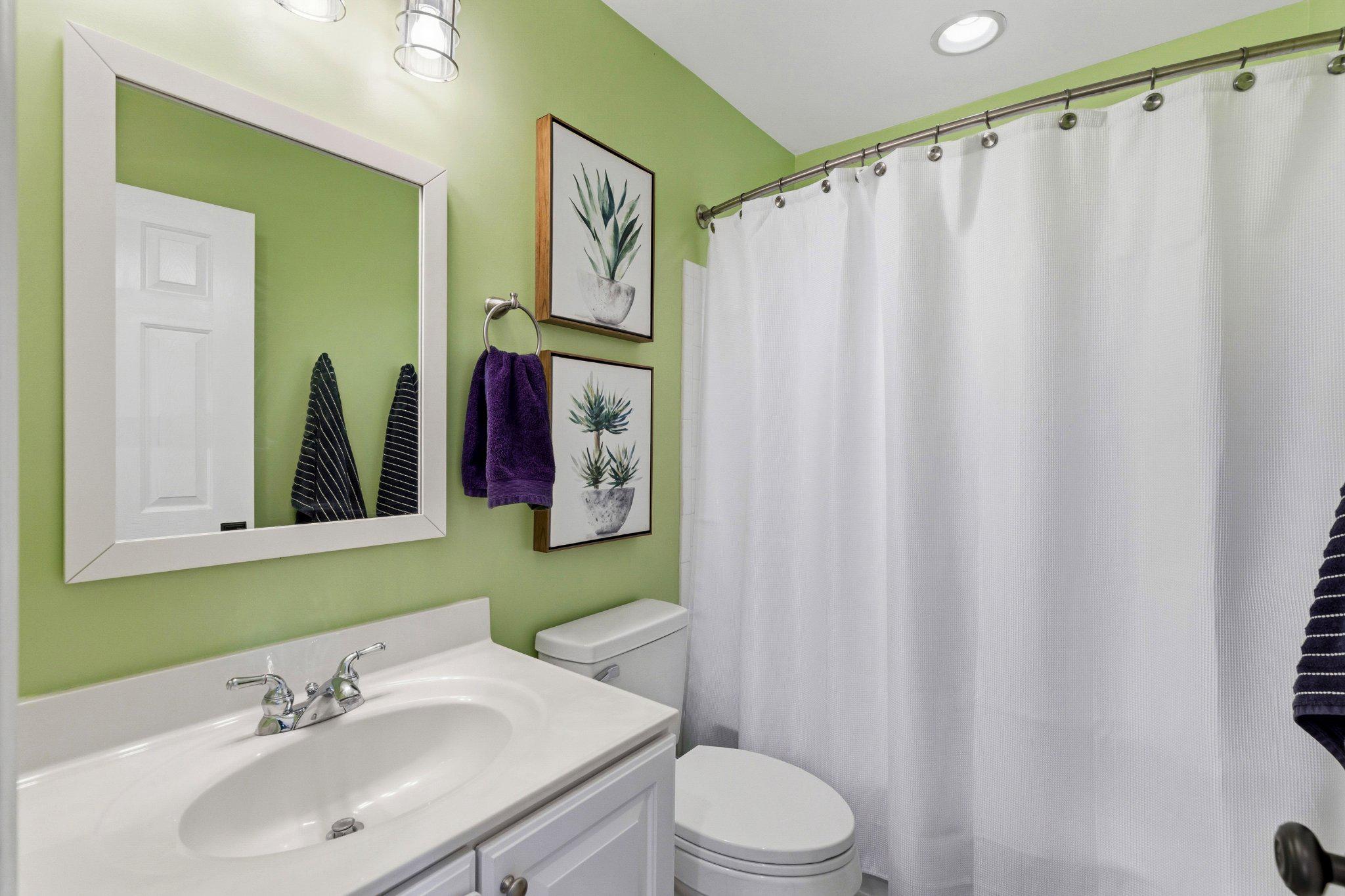 2668 Merlin Court Odenton, MD 21113 - Photo 25 of 42 a bathroom with a sink and a mirror