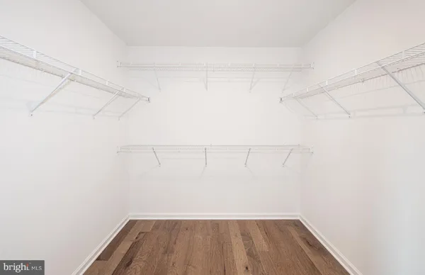 a view of a room with racks on the wall