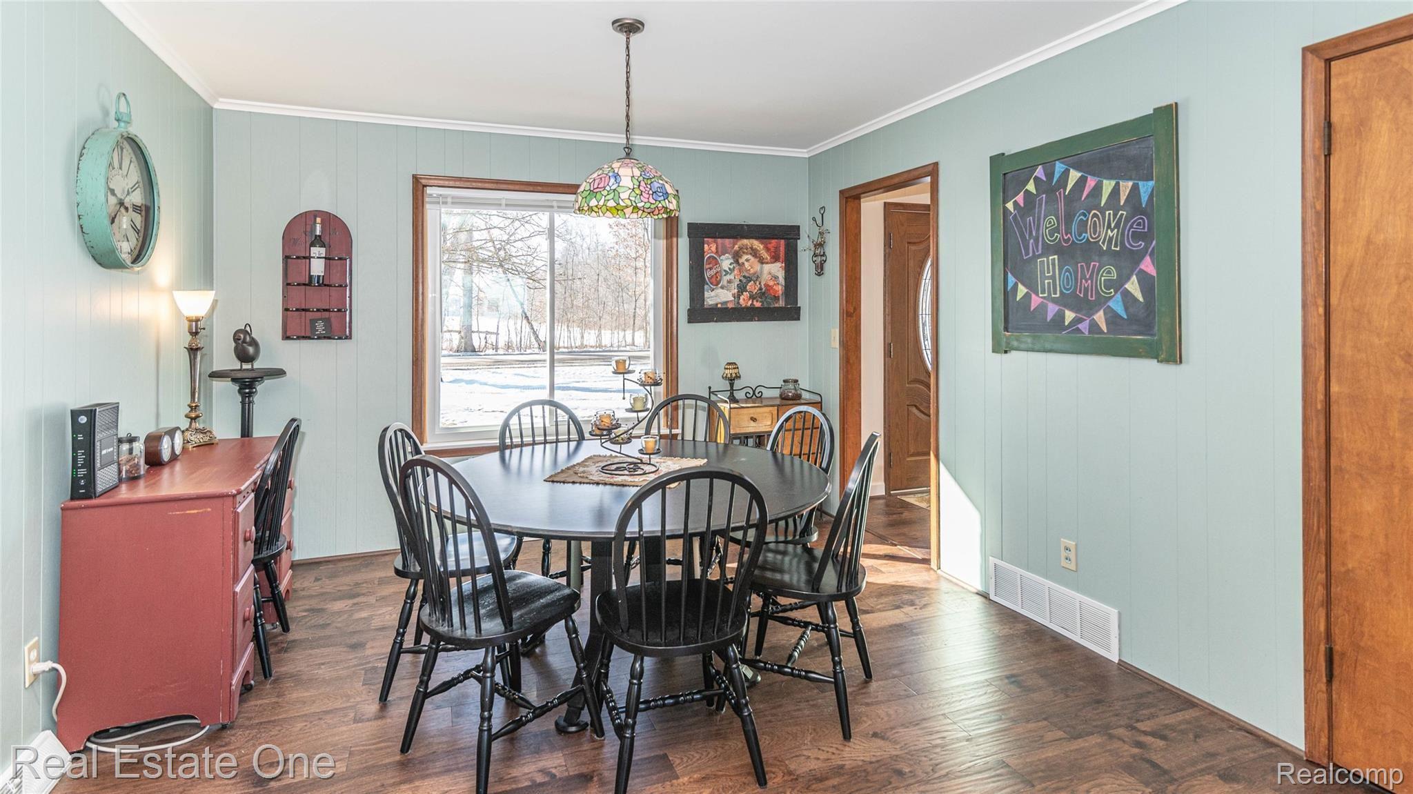 174 Henderson Road Howell, MI 48855 - Photo 6 of 30 LARGE EAT-IN KITCHEN / THIS TABLE CAN SEAT 8 PEOPLE