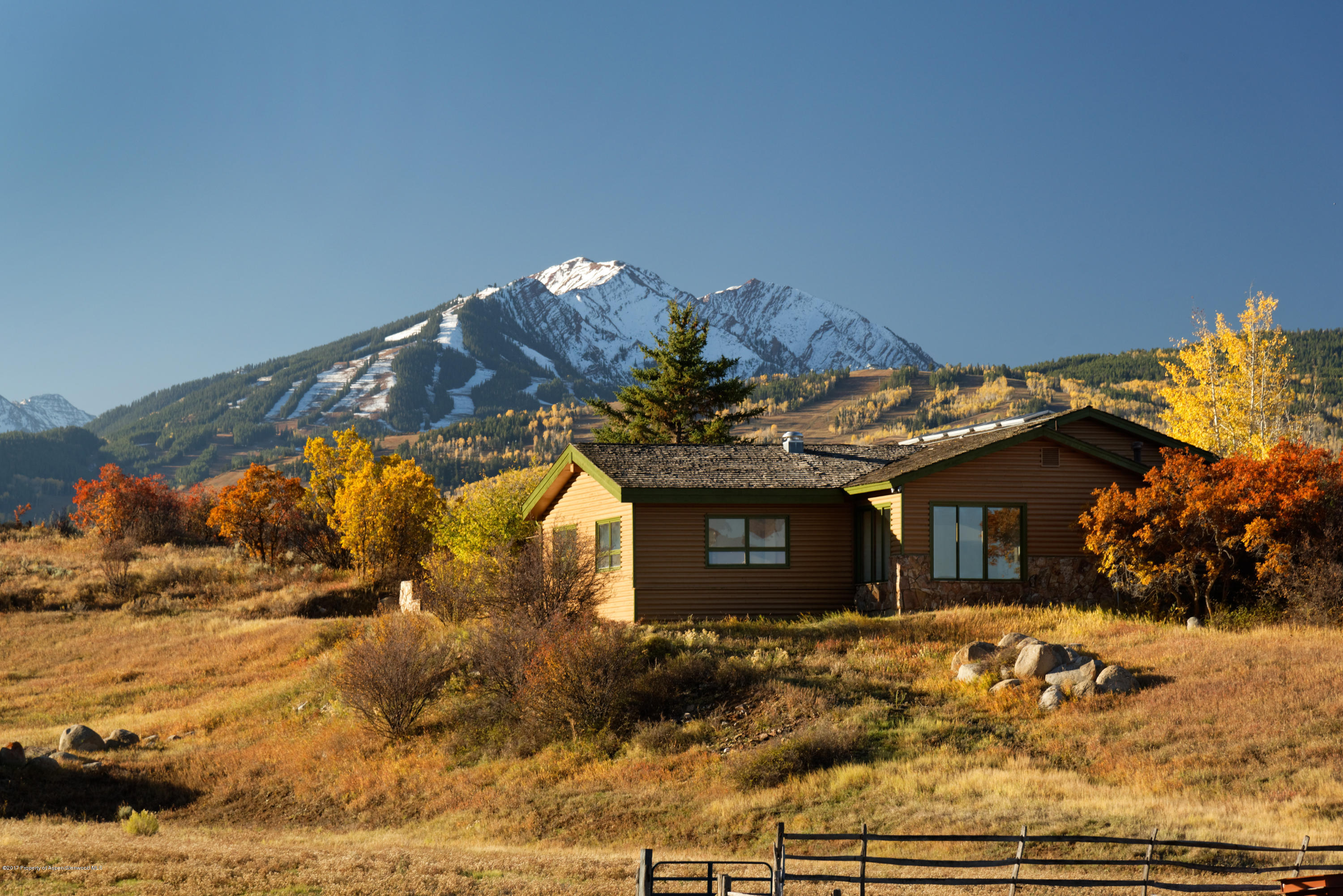1765 McLain Flats Road Aspen, CO 81612 - Photo 17 of 73 a view of a house with a yard