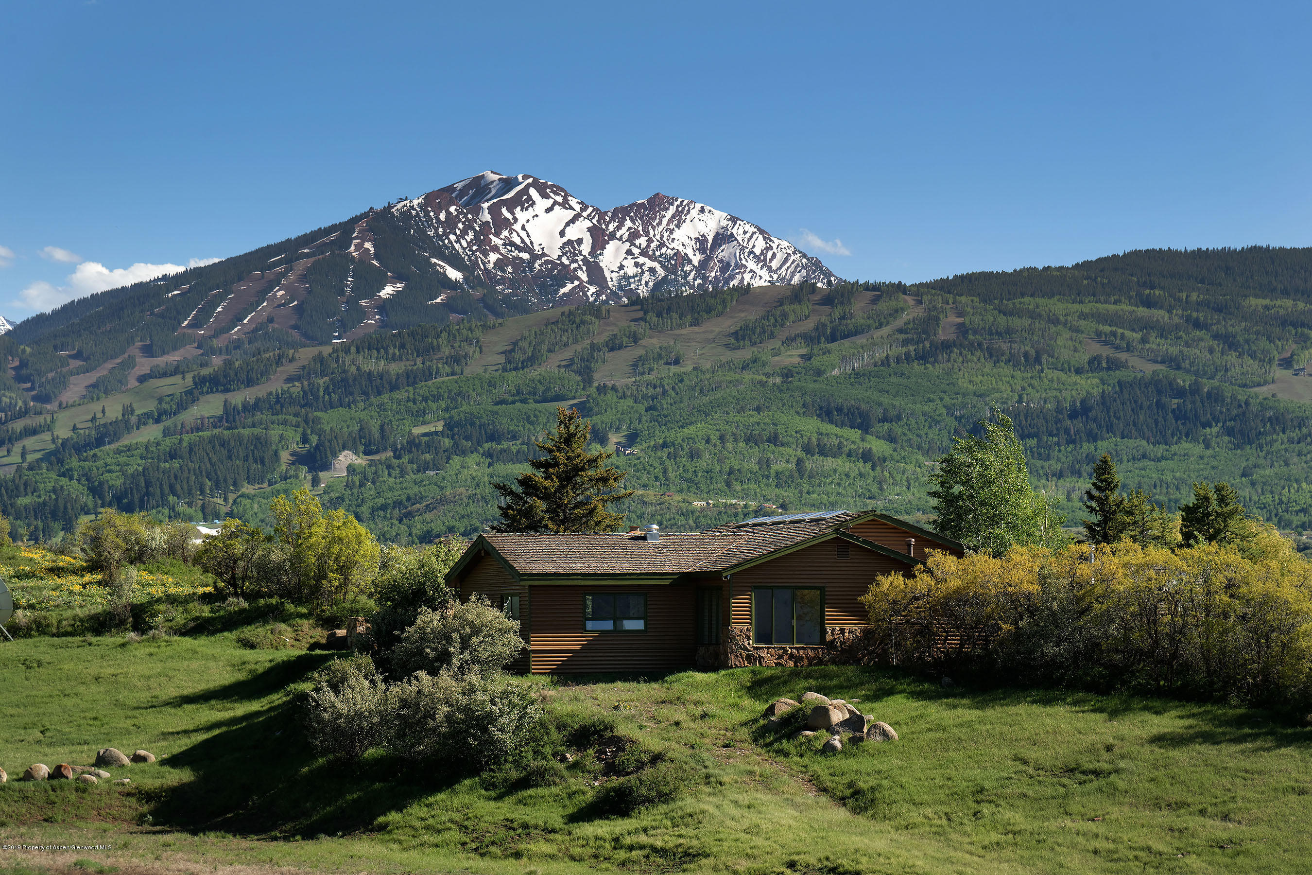 1765 McLain Flats Road Aspen, CO 81612 - Photo 5 of 73 a view of a house with a yard