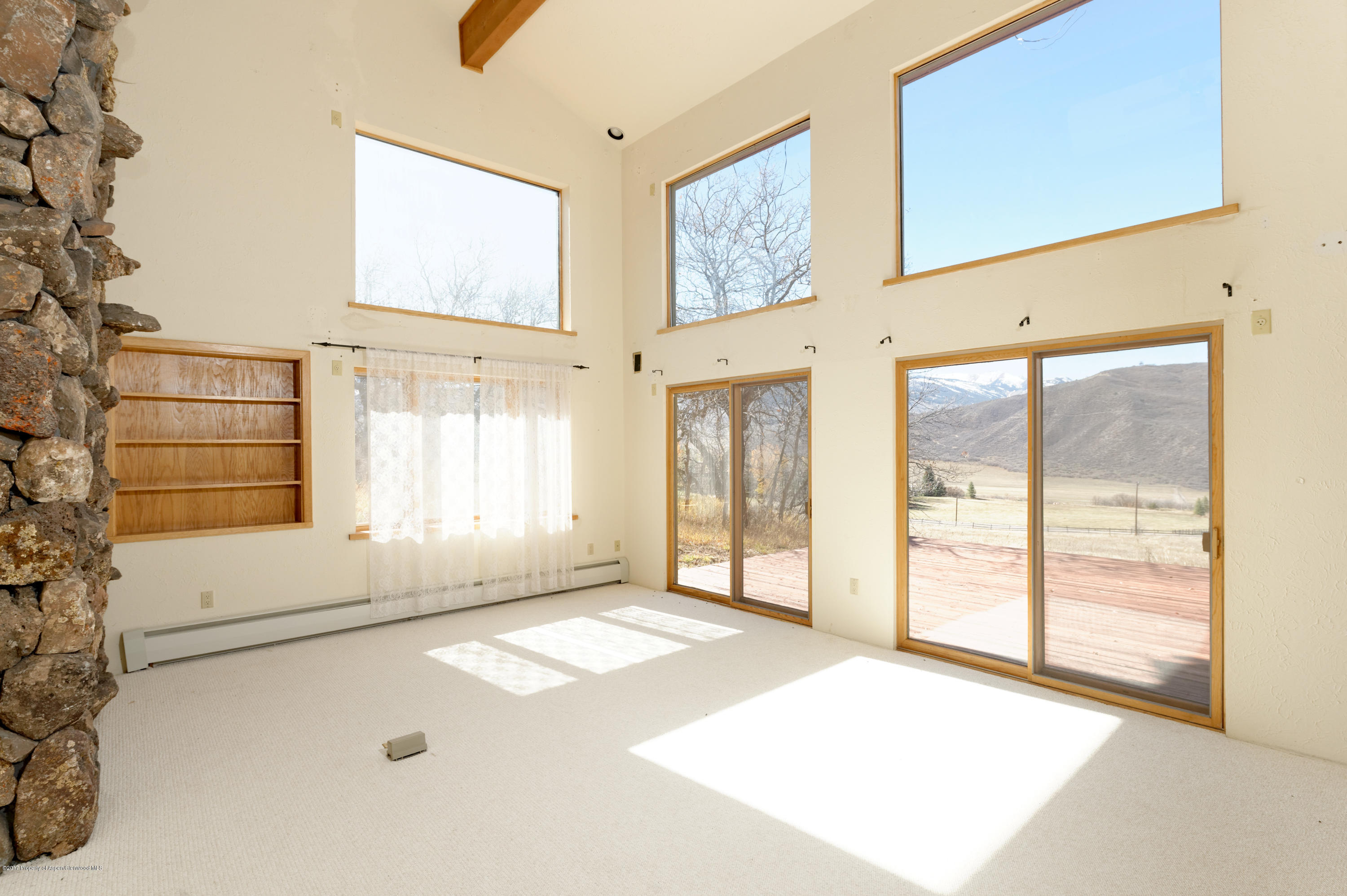 1765 McLain Flats Road Aspen, CO 81612 - Photo 56 of 73 a view of an empty room with a window