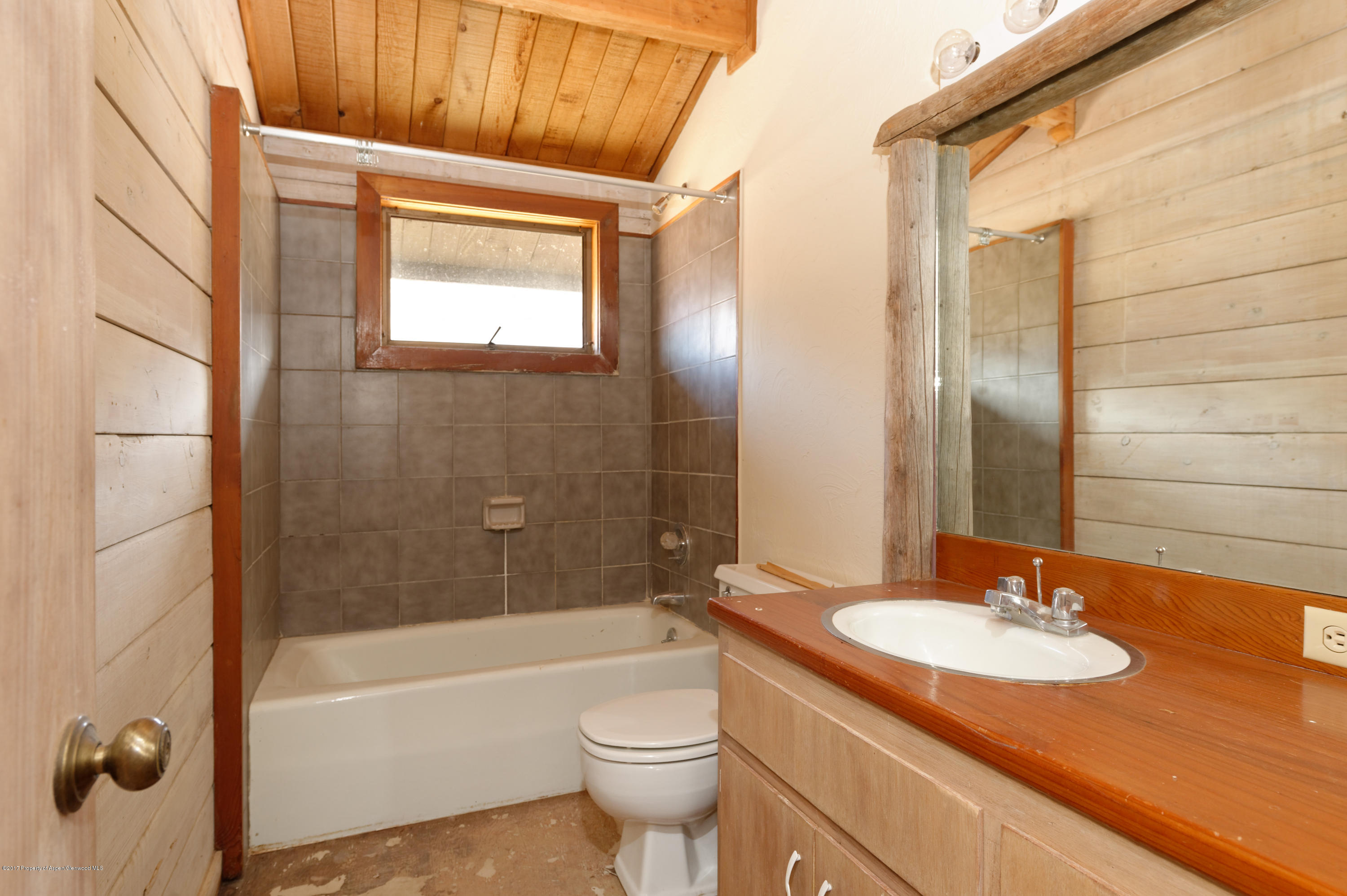 1765 McLain Flats Road Aspen, CO 81612 - Photo 66 of 73 a bathroom with a granite countertop sink toilet and shower