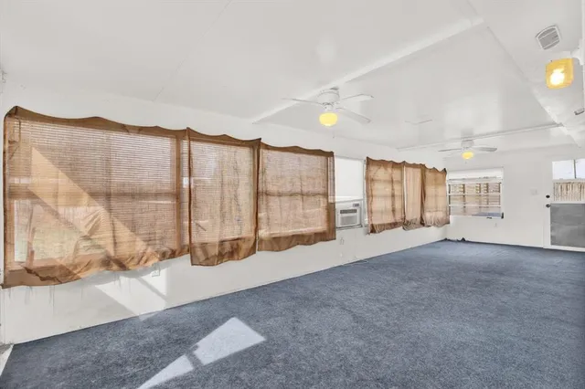 a view of a house with a big yard