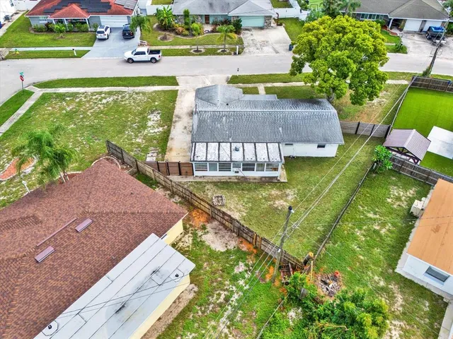 a view of a garden with houses