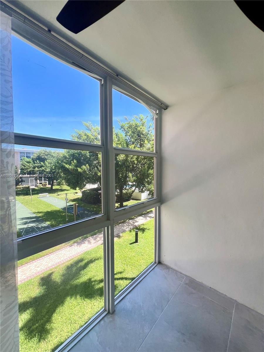 1481 South Ocean Boulevard, Unit 211E Lauderdale-by-the-Sea, FL 33062 - Photo 21 of 28 a view of an outdoor space and a window