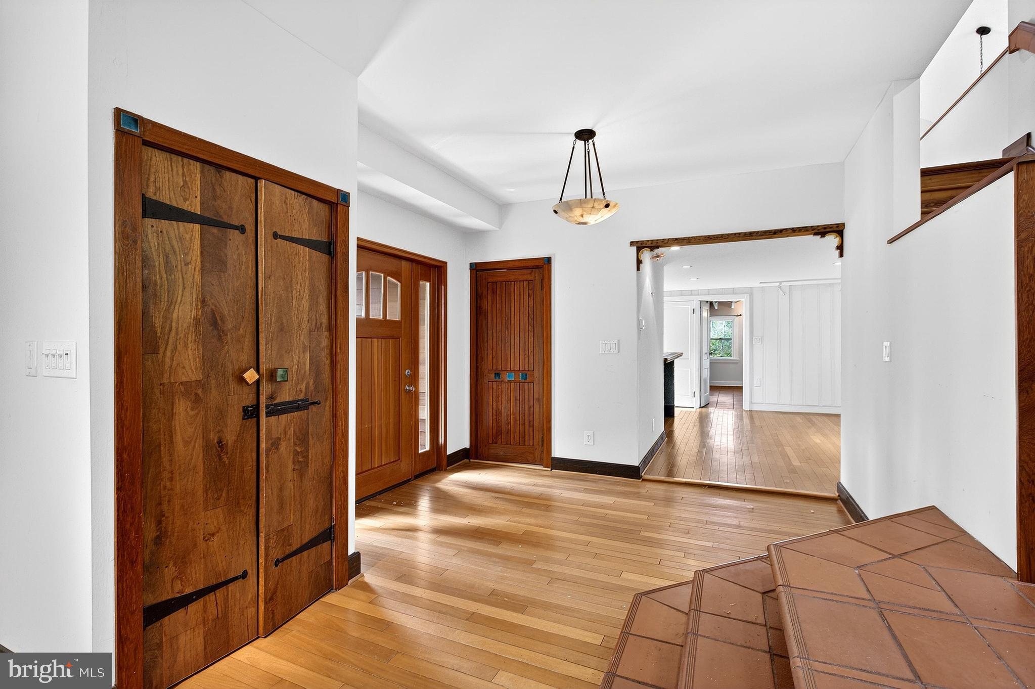 498 Perrineville Road Robbinsville, NJ 08691 - Photo 22 of 59 a view of a room with wooden floor and cabinet