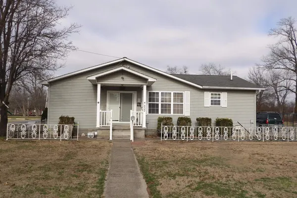 a front view of a house with patio
