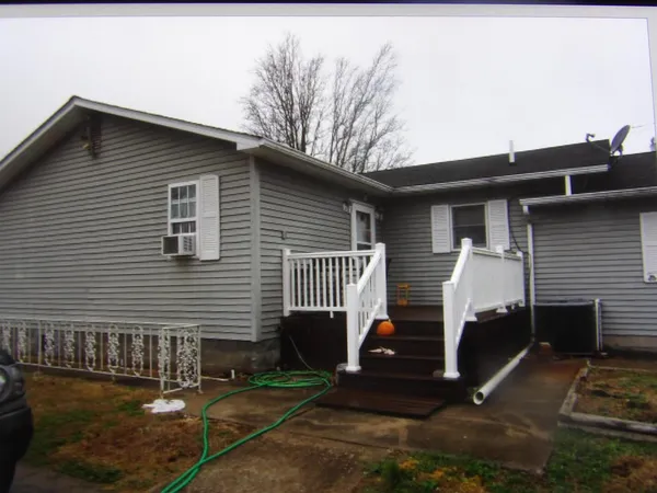 a view of backyard of house