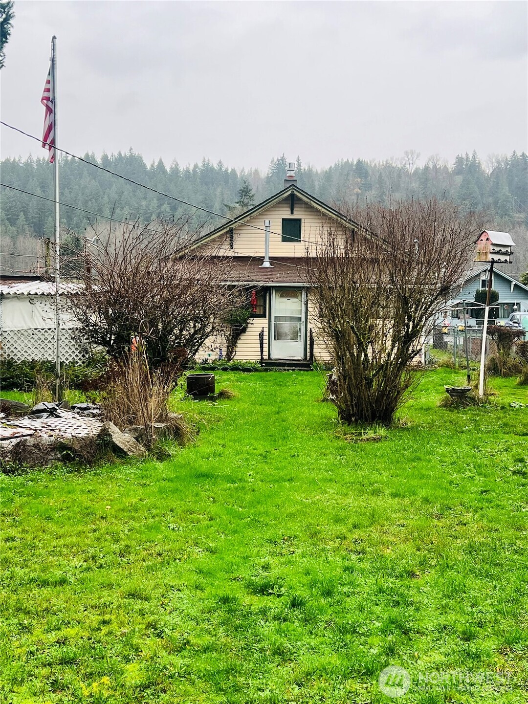 111 Varner Avenue Southeast Orting, WA 98360 - Photo 14 of 17 a aerial view of a house with garden