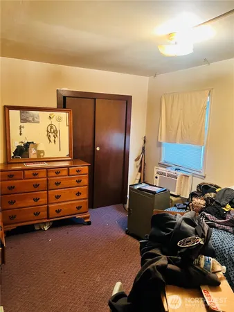 a room with furniture and air hockey table