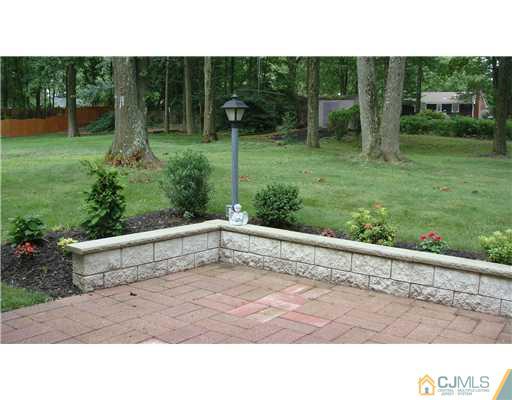 22 Huntington Road Edison, NJ 08820 - Photo 5 of 9 a view of outdoor space and yard