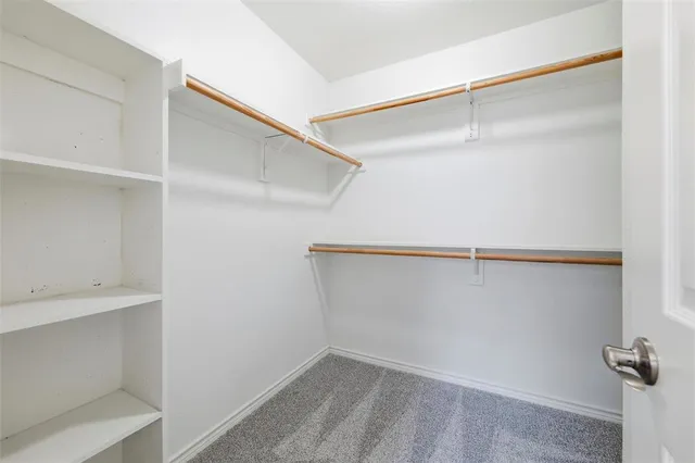 a view of an empty walk in closet