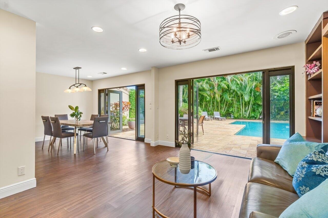 7517 Cedarwood Circle Boca Raton, FL 33434 - Photo 18 of 63 a living room with furniture and a large window