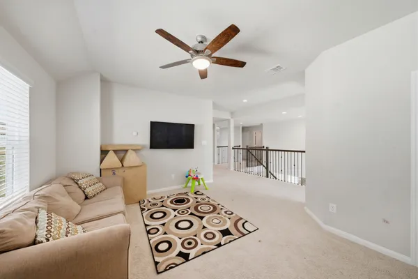a bedroom with a bed and a cabinets