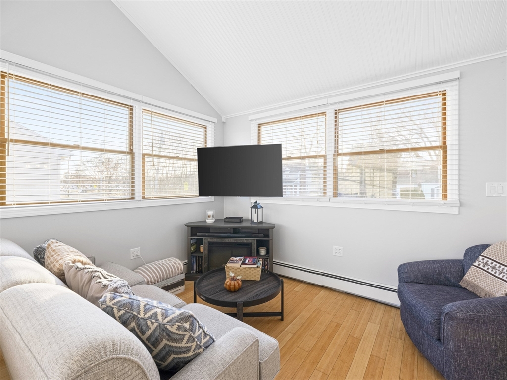1 Mansfield Drive Wakefield, MA 01880 - Photo 14 of 41 a bedroom with furniture and a window