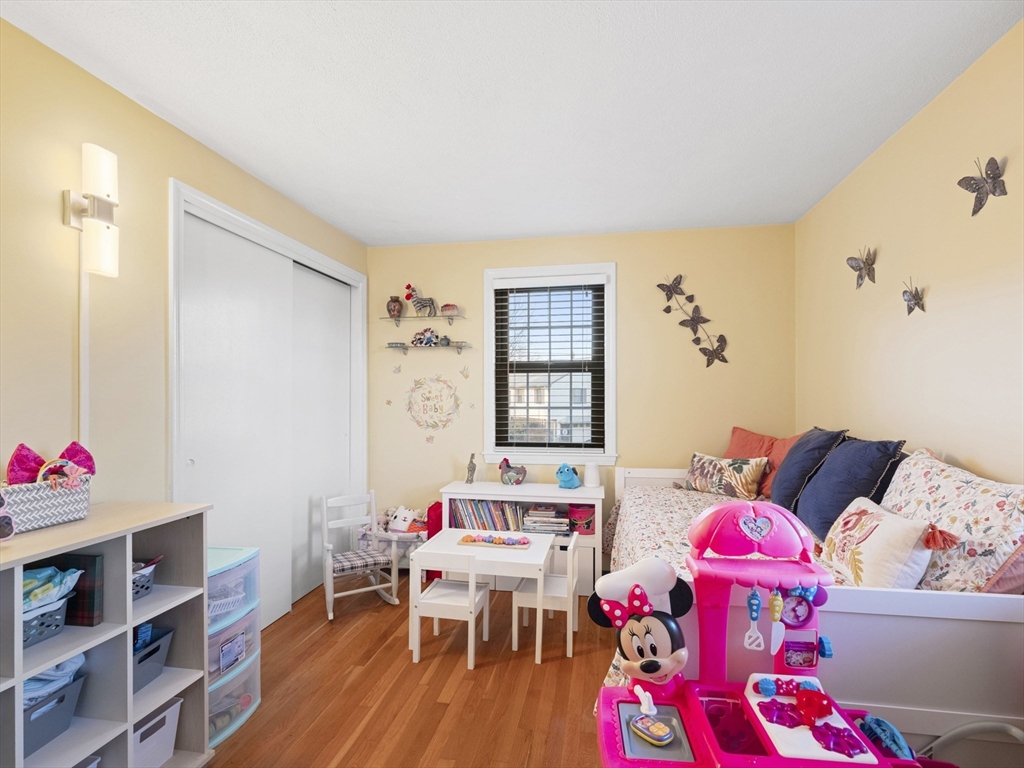 1 Mansfield Drive Wakefield, MA 01880 - Photo 21 of 41 a living room with furniture and baby couch