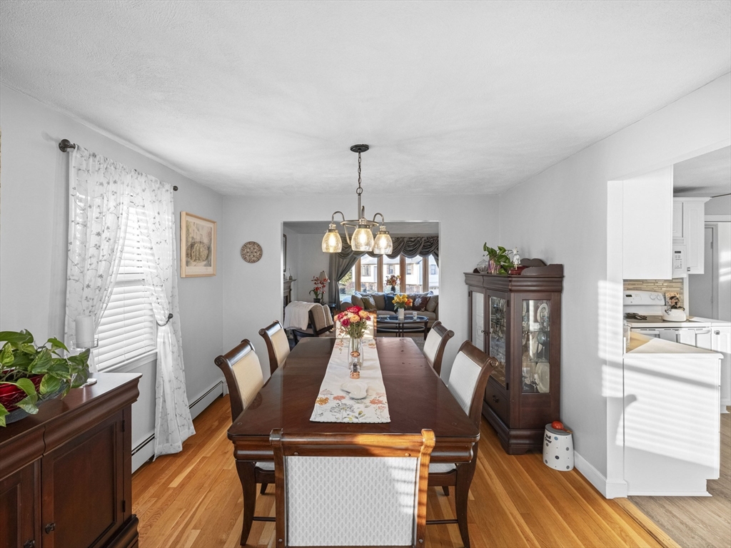 1 Mansfield Drive Wakefield, MA 01880 - Photo 7 of 41 a view of a dining room with furniture window and wooden floor