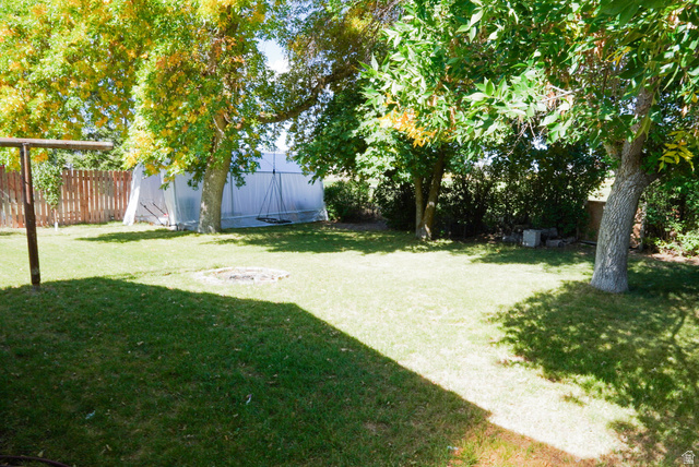 324 Stringtown Road Georgetown, ID 83239 - Photo 29 of 49 Fenced backyard with a storage shed