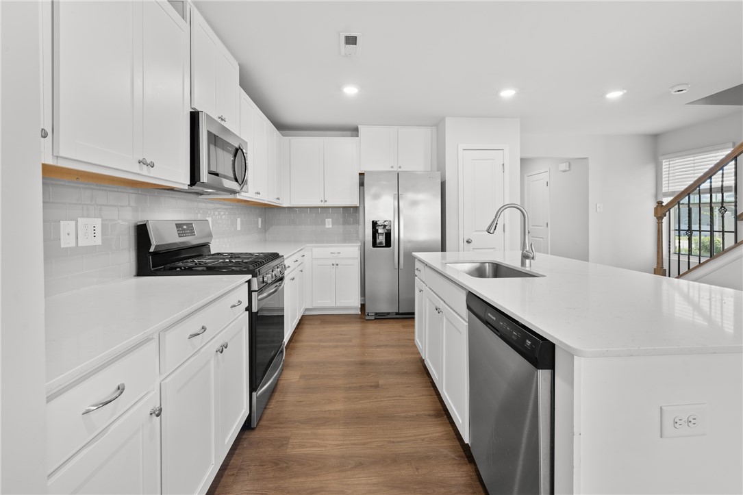 520 Brasstown Court Pendleton, SC 29670 - Photo 5 of 29 This bright, functional kitchen features sleek appliances and ample counter space for culinary endeavors.