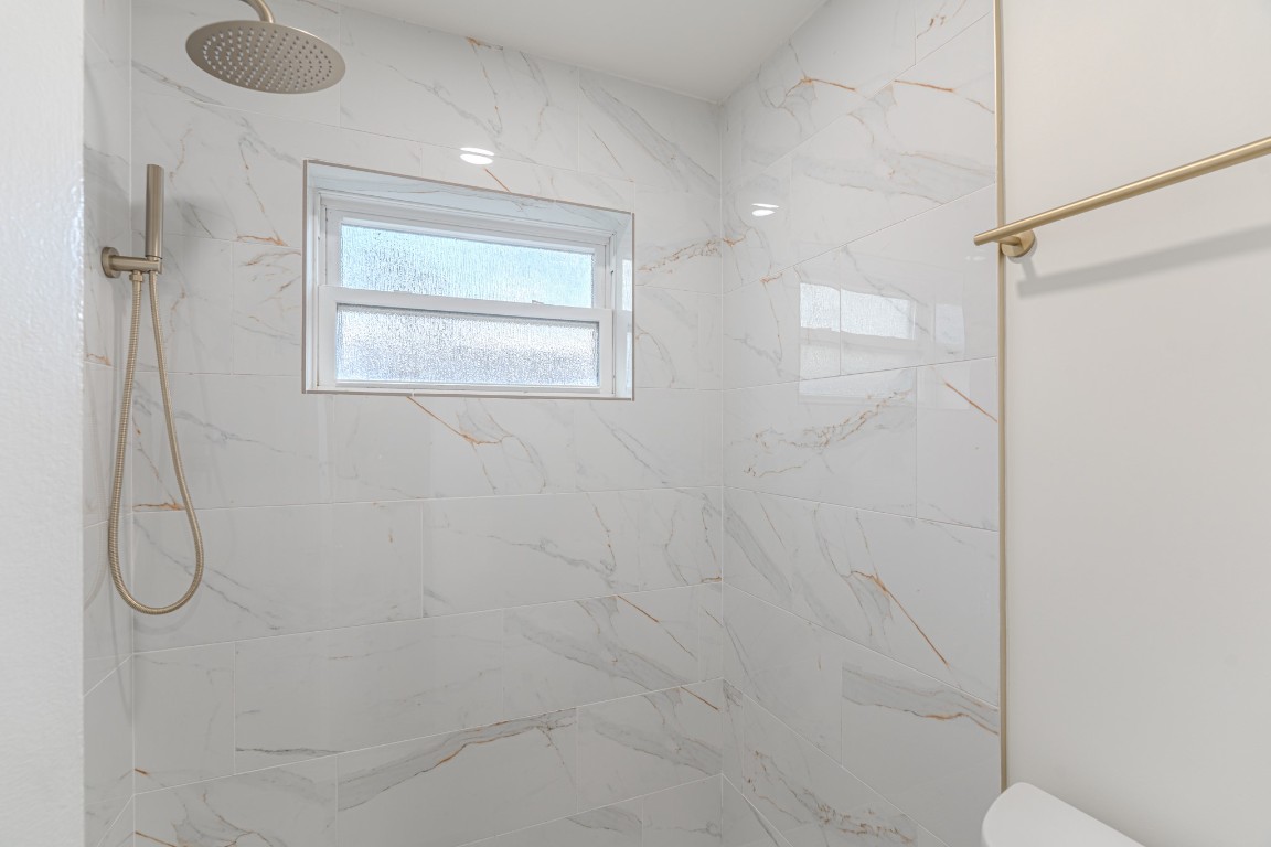 5819 Sunnygate Drive Spring, TX 77373 - Photo 16 of 26 a bathroom with a shower