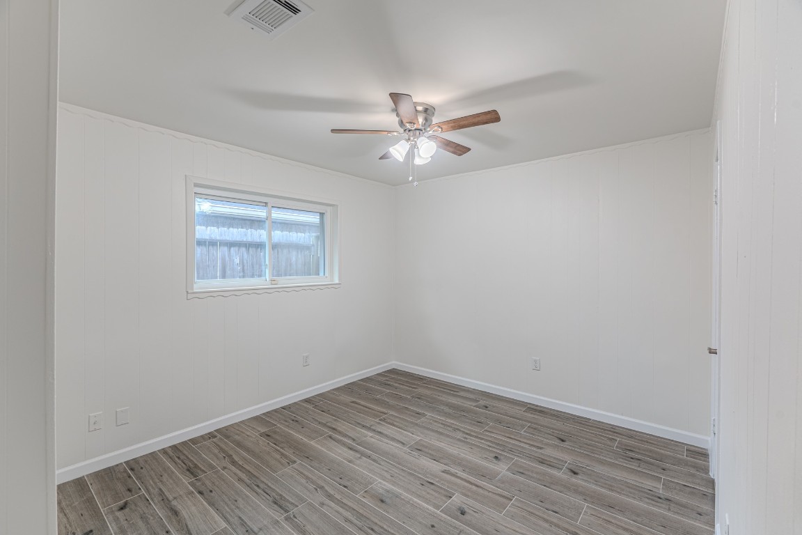 5819 Sunnygate Drive Spring, TX 77373 - Photo 18 of 26 wooden floor in an empty room