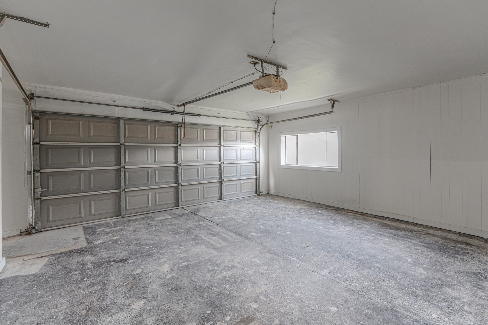 5819 Sunnygate Drive Spring, TX 77373 - Photo 23 of 26 a view of an empty room with a window