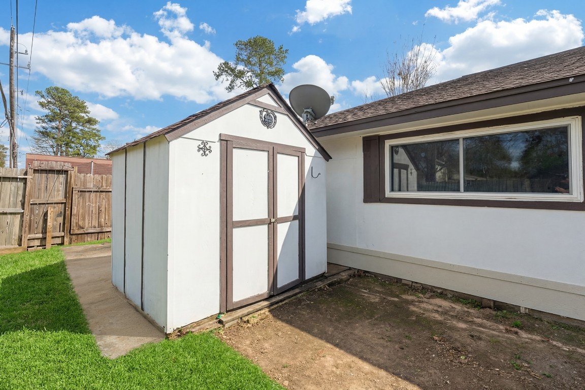 5819 Sunnygate Drive Spring, TX 77373 - Photo 26 of 26 a view of a house with a yard