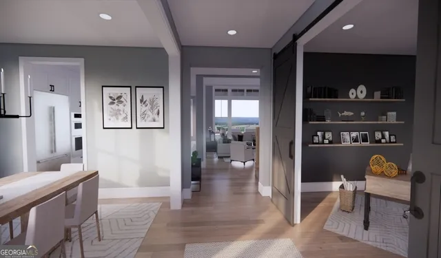 a hallway with a view of living room