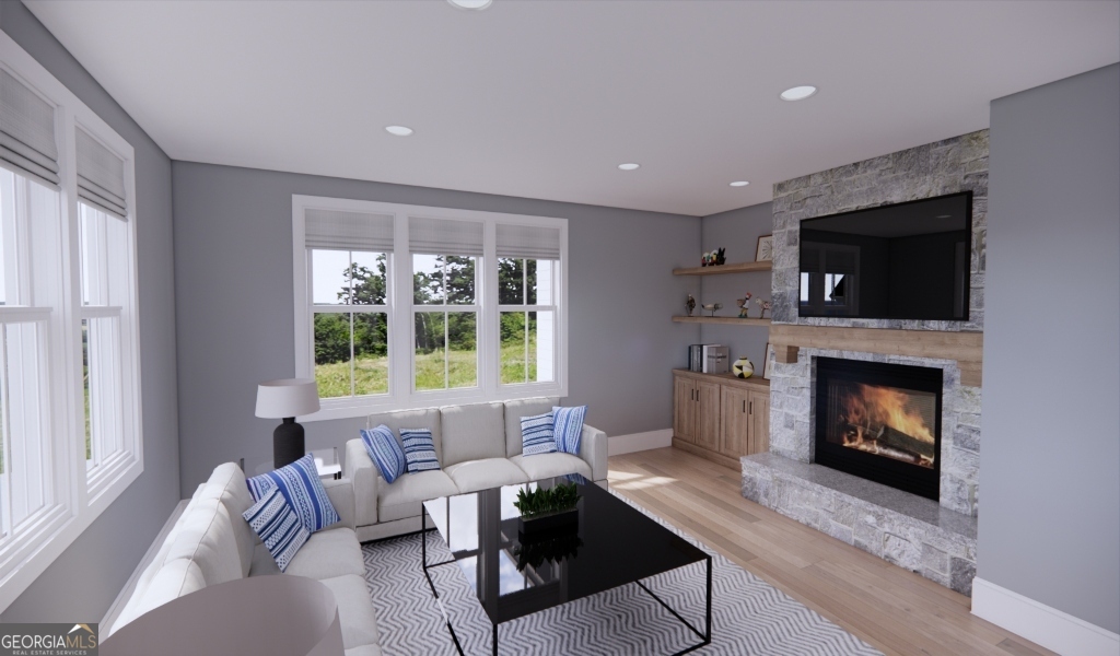 0 Highway 100, Unit TRACT 3 Waco, GA 30182 - Photo 12 of 24 a living room with furniture a flat screen tv and a fireplace