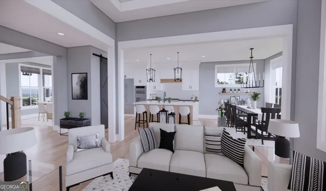 a living room with furniture and a chandelier